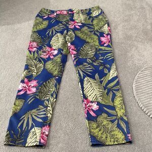 Blue jeans, style background with pink flowers and green leaves Chicos brand